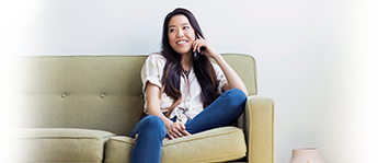 Smiling woman relaxing on the couch